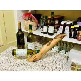 Handmade Greek Olive Wood Wine Bottle Holder — lifestyle view